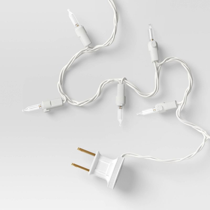 slide 4 of 4, 100ct LED Smooth Mini Christmas String Lights Warm White with White Wire - Wondershop™, 100 ct