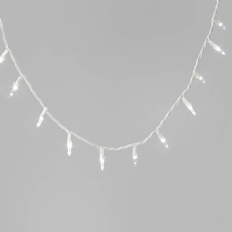 slide 1 of 4, 100ct LED Smooth Mini Christmas String Lights Warm White with White Wire - Wondershop™, 100 ct