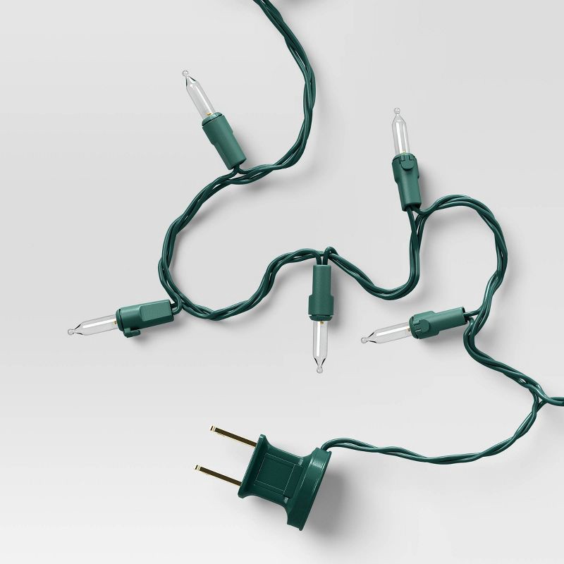 slide 5 of 5, 100ct LED Indoor Outdoor Smooth Mini Christmas String Lights Cool White with Green Wire - Wondershop™, 100 ct