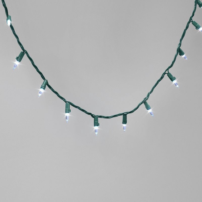 slide 1 of 5, 100ct LED Indoor Outdoor Smooth Mini Christmas String Lights Cool White with Green Wire - Wondershop™, 100 ct