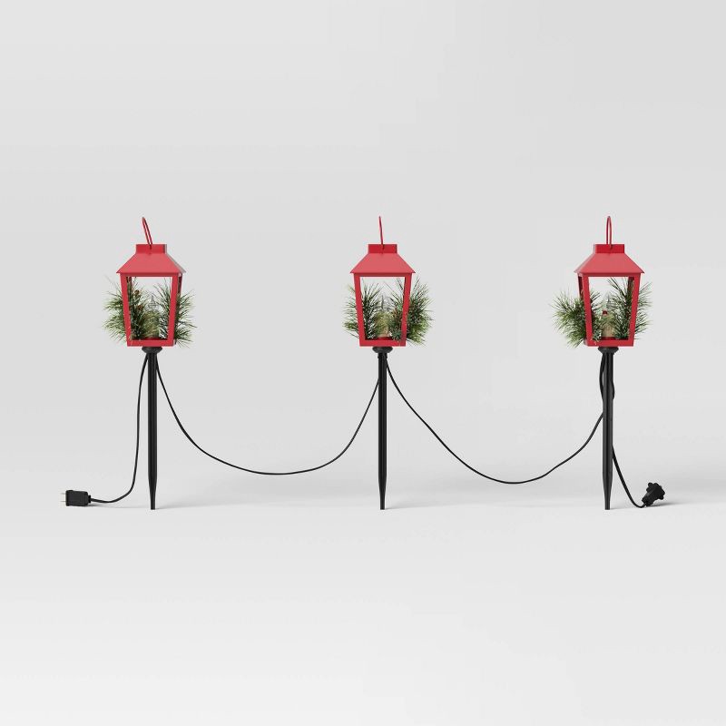 slide 3 of 5, 3pc Incandescent Red Metal Lantern with Greenery Christmas Novelty Path Light Clear - Wondershop™: UL Listed, Festive Outdoor Decor, 3 ct