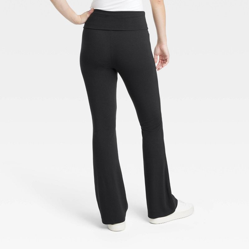 slide 2 of 3, Women's Fold Over Waistband Flare Leggings with Pockets - A New Day™ Black L: High Rise, Midweight Jersey, 1 ct