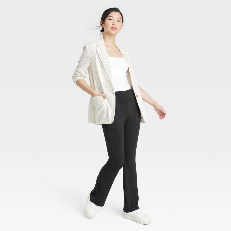 slide 3 of 3, Women's Fold Over Waistband Flare Leggings with Pockets - A New Day™ Black L: High Rise, Midweight Jersey, 1 ct