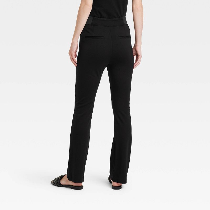 slide 2 of 3, Women's High Waisted Ponte Flare Leggings with Pockets - A New Day™ Black L: Mid Rise, Power Stretch, Fashion Pants, 1 ct