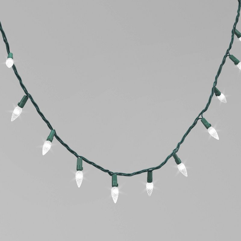 slide 1 of 4, 60ct LED Faceted C6 Christmas String Lights Twinkling Warm White with Green Wire - Wondershop™: Indoor/Outdoor, UL Listed, 60 ct