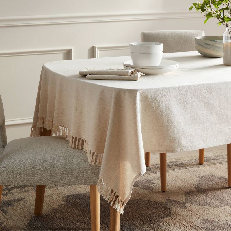 slide 2 of 3, 60" x 104" Cotton Slub Tablecloth with Tied Fringe Light Beige - Threshold™, 1 ct
