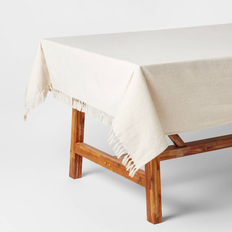 slide 1 of 3, 60" x 104" Cotton Slub Tablecloth with Tied Fringe Light Beige - Threshold™, 1 ct