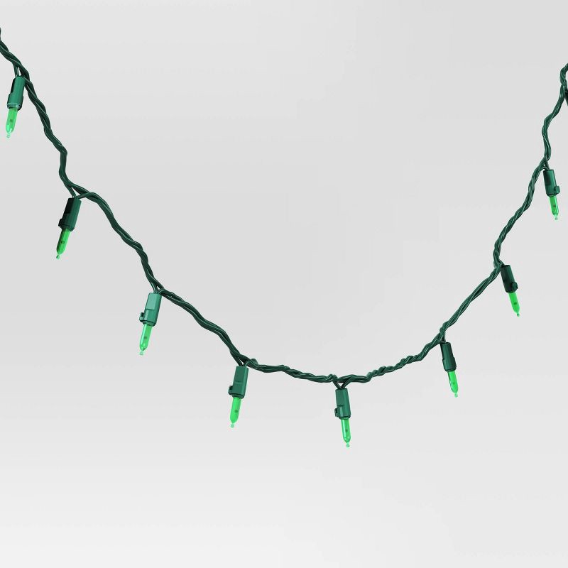 slide 3 of 4, 100ct LED Smooth Mini Christmas String Lights Green with Green Wire - Wondershop™, 100 ct