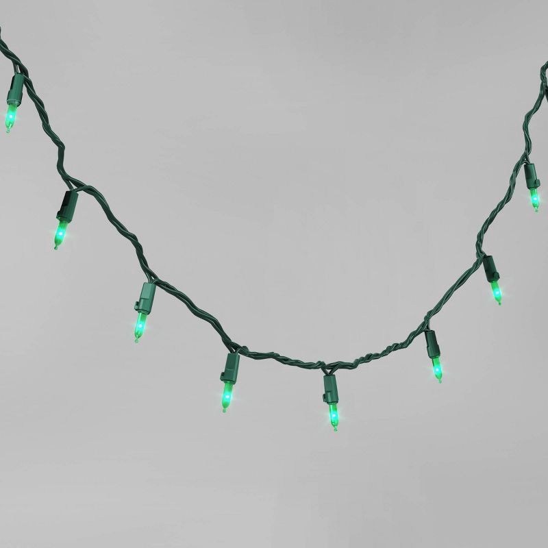 slide 1 of 4, 100ct LED Smooth Mini Christmas String Lights Green with Green Wire - Wondershop™, 100 ct