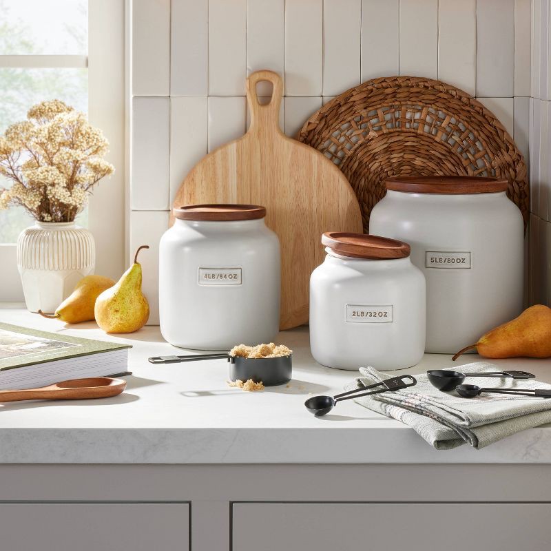 slide 2 of 4, Hearth & Hand with Magnolia 80oz Dry Goods Stoneware Canister with Wood Lid Cream/Brown - Hearth & Hand™ with Magnolia, 80 oz