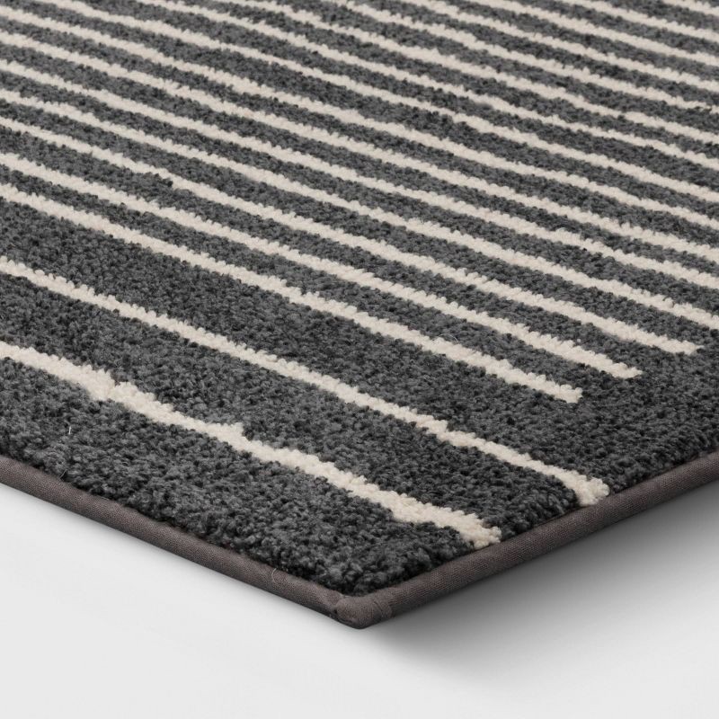 slide 3 of 4, 2'6"x4' Washable Washable Knitted Stripe Accent Rug Gray - Threshold™: Indoor Low Pile Modern Rectangle Rug, 1 ct