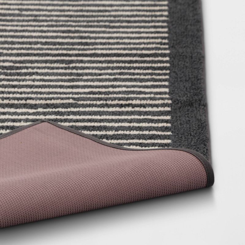 slide 4 of 4, 2'6"x4' Washable Washable Knitted Stripe Accent Rug Gray - Threshold™: Indoor Low Pile Modern Rectangle Rug, 1 ct