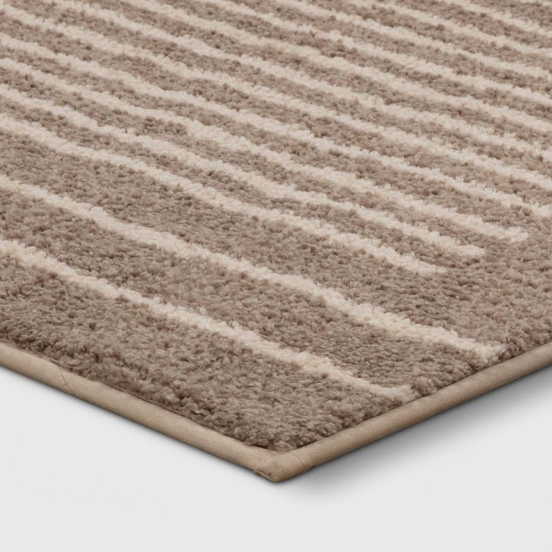 slide 3 of 4, 2'6"x4' Washable Knitted Stripe Accent Rug Tan - Threshold™: Indoor Low Pile Rectangle, Machine Washable, 1 ct