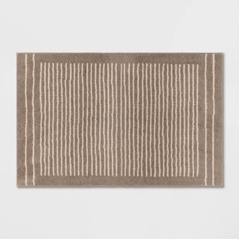 slide 1 of 4, 2'6"x4' Washable Knitted Stripe Accent Rug Tan - Threshold™: Indoor Low Pile Rectangle, Machine Washable, 1 ct