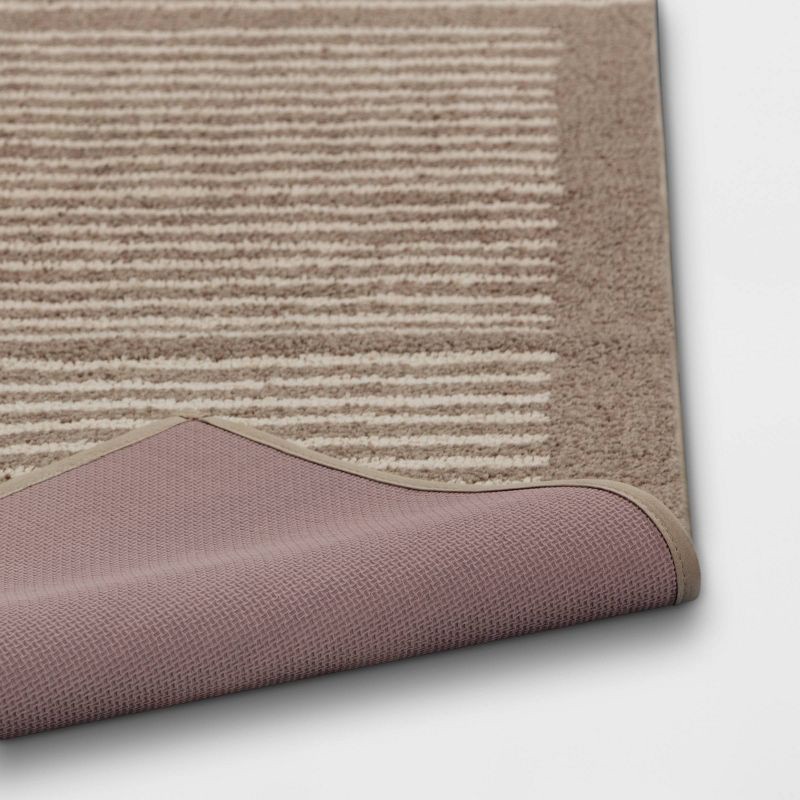 slide 4 of 4, 2'6"x4' Washable Knitted Stripe Accent Rug Tan - Threshold™: Indoor Low Pile Rectangle, Machine Washable, 1 ct