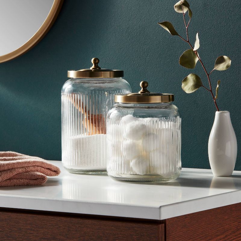 slide 2 of 4, Medium Glass Bath Canister Brass - Threshold™: Elegant Storage Jar with Lid for Bathroom Organization, 43.9oz Capacity, 43.9 oz