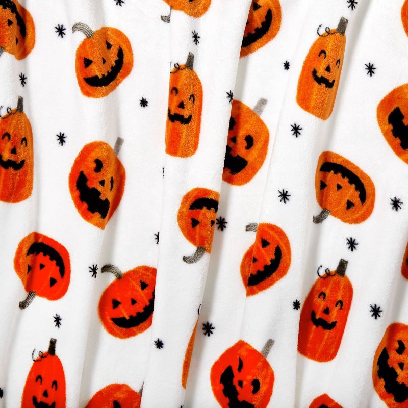 slide 3 of 4, Tossed Small Jack-O-Lanterns Halloween Throw Blanket - Hyde & EEK! Boutique, 1 ct