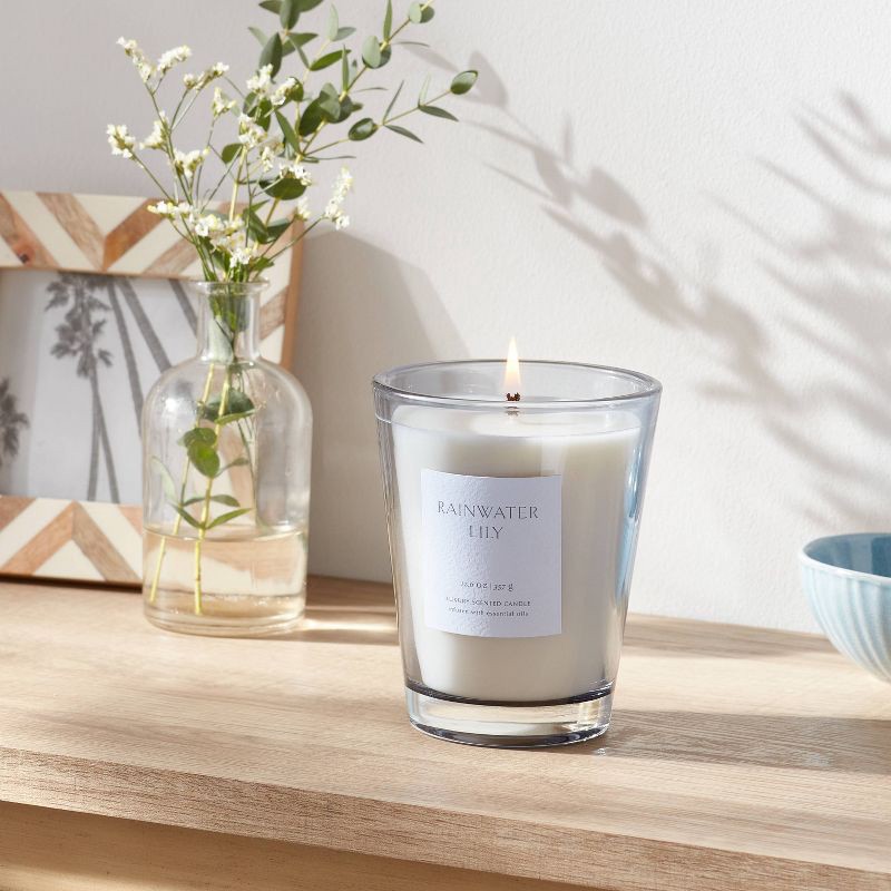 slide 2 of 5, 12.6oz Rainwater Lily & Peach Scented Candle with Glass Vase & Dustcover - Threshold™: Palm Wax, 52hr Burn Time, 12.6 oz