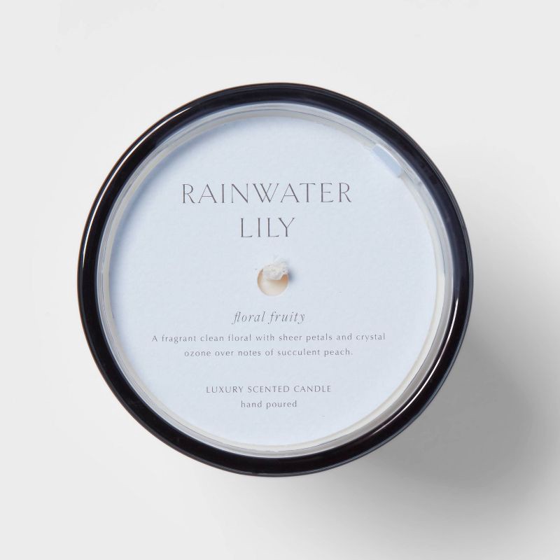 slide 5 of 5, 12.6oz Rainwater Lily & Peach Scented Candle with Glass Vase & Dustcover - Threshold™: Palm Wax, 52hr Burn Time, 12.6 oz