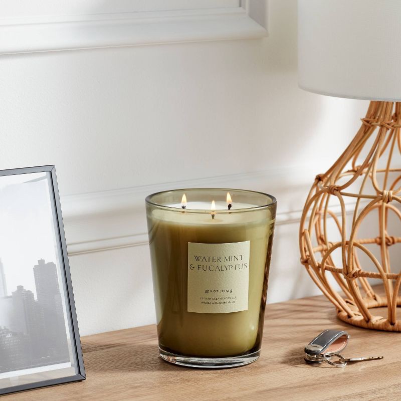 slide 2 of 5, Colored Vase Glass with Dustcover Watermint and Eucalyptus Jar Candle Green 35.8oz - Threshold™: Palm Wax, 70hr Burn Time, 35.8 oz