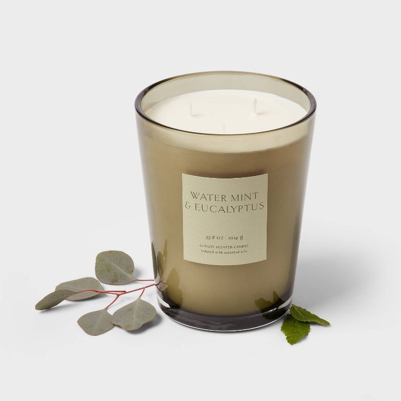 slide 3 of 5, Colored Vase Glass with Dustcover Watermint and Eucalyptus Jar Candle Green 35.8oz - Threshold™: Palm Wax, 70hr Burn Time, 35.8 oz