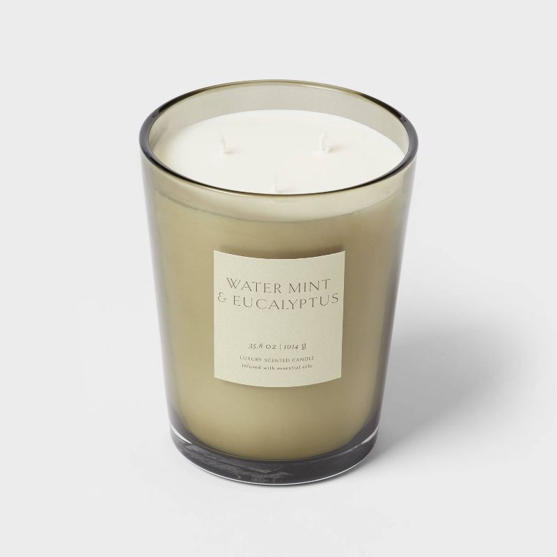 slide 4 of 5, Colored Vase Glass with Dustcover Watermint and Eucalyptus Jar Candle Green 35.8oz - Threshold™: Palm Wax, 70hr Burn Time, 35.8 oz