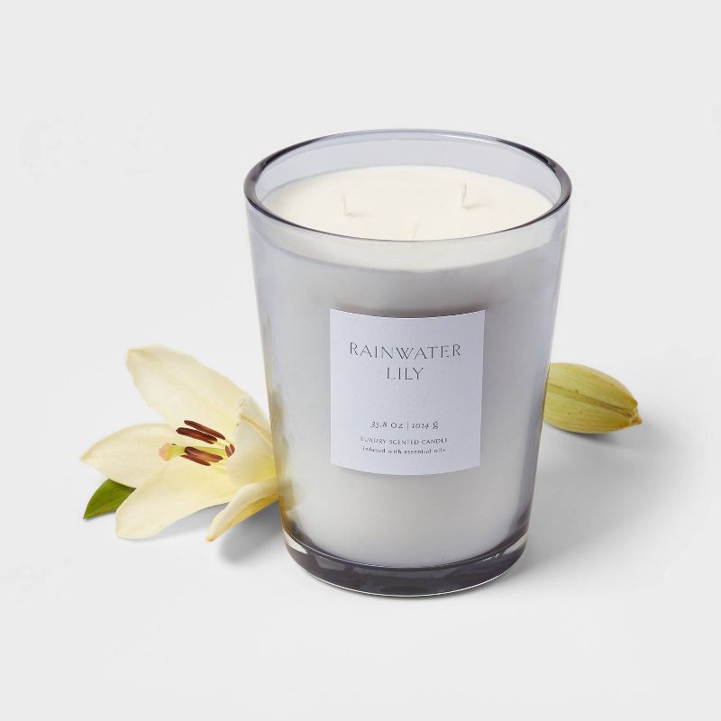 slide 3 of 5, 35.8oz Colored Vase Glass with Dustcover Rainwater Lily Candle Gray - Threshold™: Peach, Palm Wax, 70hr Burn Time, 35.8 oz
