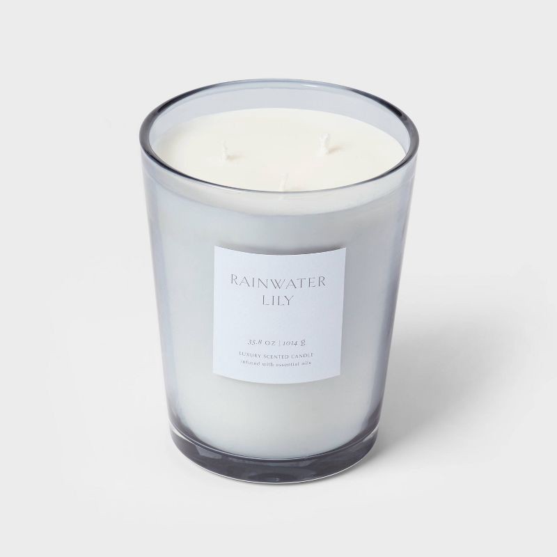 slide 4 of 5, 35.8oz Colored Vase Glass with Dustcover Rainwater Lily Candle Gray - Threshold™: Peach, Palm Wax, 70hr Burn Time, 35.8 oz
