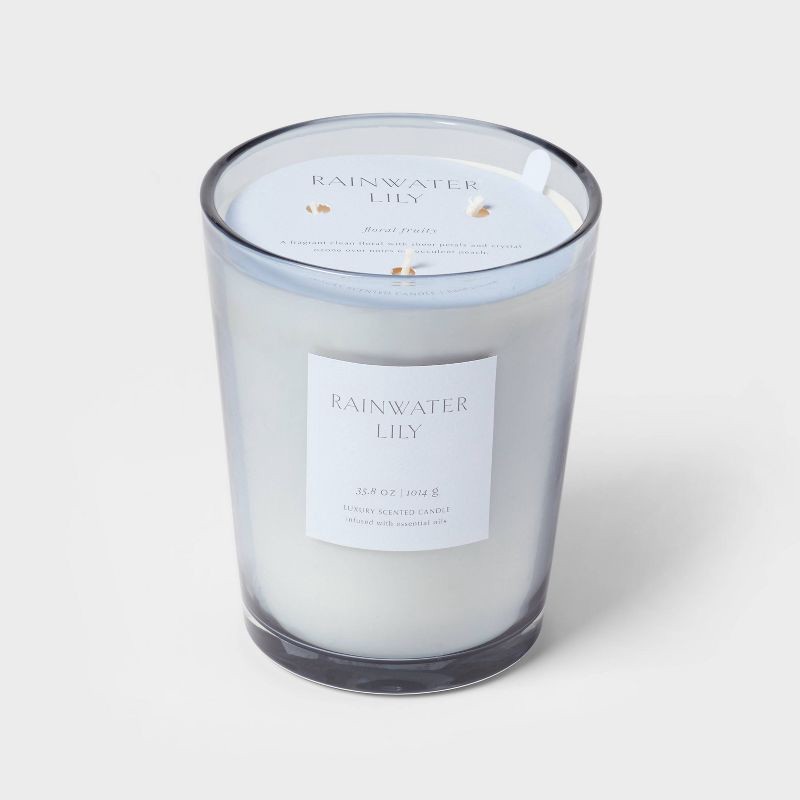 slide 1 of 5, 35.8oz Colored Vase Glass with Dustcover Rainwater Lily Candle Gray - Threshold™: Peach, Palm Wax, 70hr Burn Time, 35.8 oz