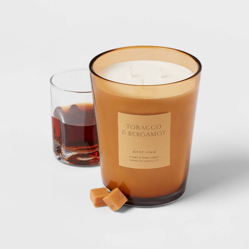 slide 3 of 5, 35.8oz Colored Vase Glass with Dustcover Tobacco and Bergamot Candle Yellow - Threshold™: Palm Wax, 3-Wick, 70hr Burn Time, 35.8 oz