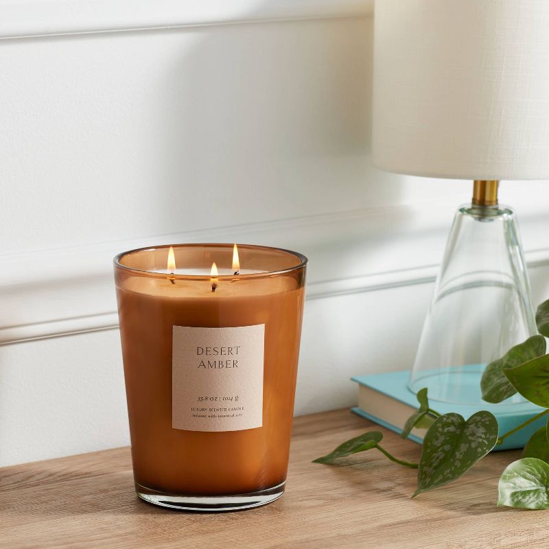 slide 2 of 5, 35.8oz Desert Amber Candle with Dustcover - Threshold™: Palm Wax, 3 Wicks, 70hr Burn Time, 35.8 oz