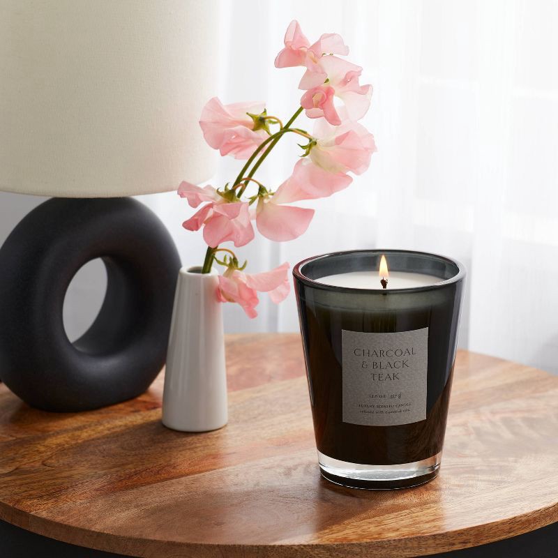 slide 2 of 5, 12.6oz Colored Vase Glass with Dustcover & Black Teak Candle Black - Threshold™: Oakmoss, Lavender Scent, 52hr Burn Time, 12.6 oz