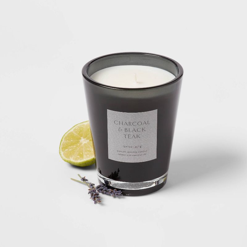 slide 3 of 5, 12.6oz Colored Vase Glass with Dustcover & Black Teak Candle Black - Threshold™: Oakmoss, Lavender Scent, 52hr Burn Time, 12.6 oz