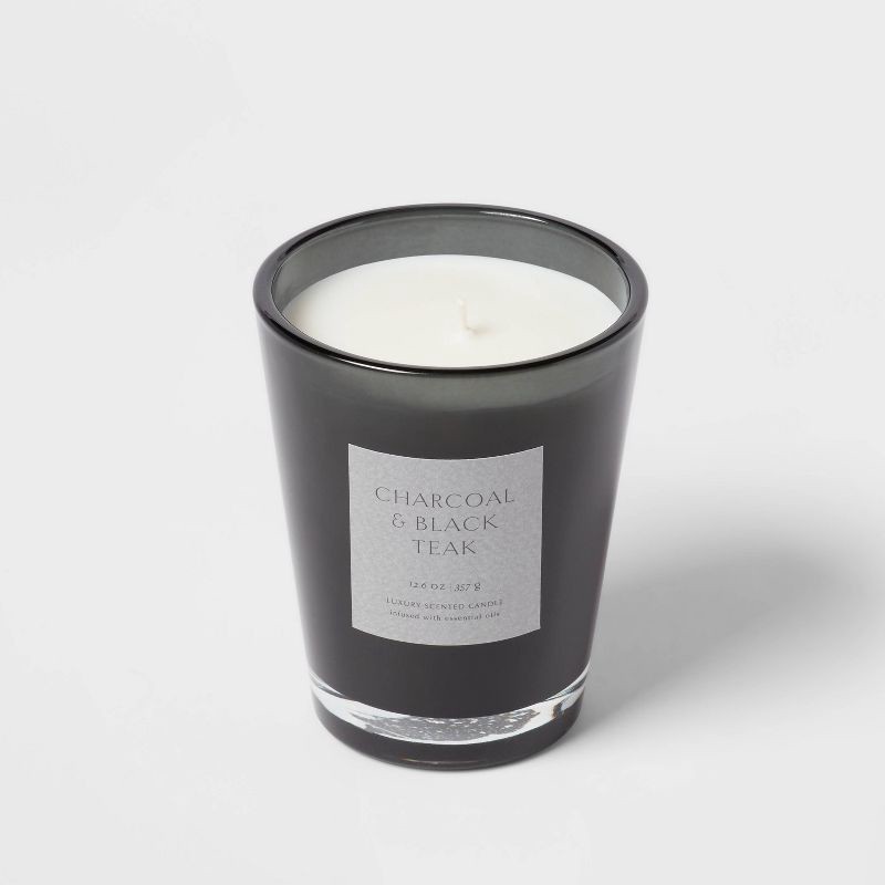 slide 4 of 5, 12.6oz Colored Vase Glass with Dustcover & Black Teak Candle Black - Threshold™: Oakmoss, Lavender Scent, 52hr Burn Time, 12.6 oz
