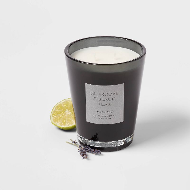 slide 3 of 5, 22.4oz Colored Vase Glass with Dustcover & Black Teak Candle Black - Threshold™: Oakmoss & Lavender Scent, 64hr Burn Time, 22.4 oz