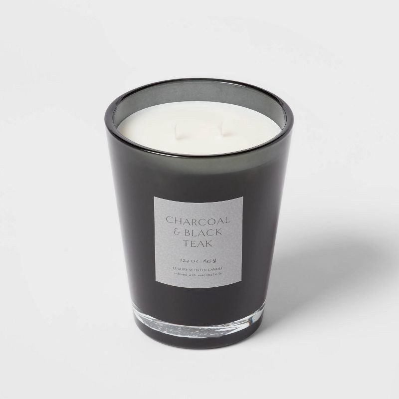 slide 4 of 5, 22.4oz Colored Vase Glass with Dustcover & Black Teak Candle Black - Threshold™: Oakmoss & Lavender Scent, 64hr Burn Time, 22.4 oz