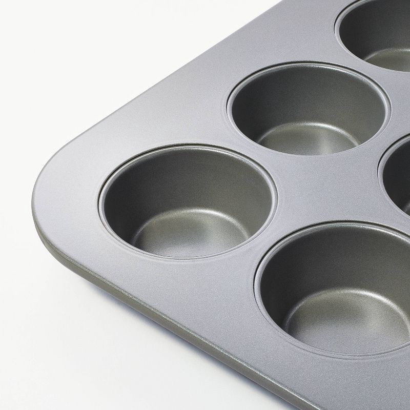 slide 3 of 5, 12ct Nonstick Aluminized Steel Muffin Pan with Lid Clear - Figmint™: Bakeware, Oven-Safe, Dishwasher-Safe, PTFE-Free, 12 ct
