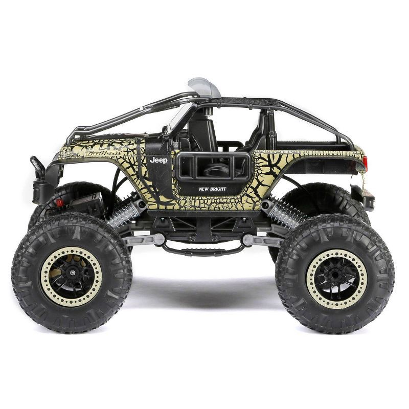 slide 2 of 11, New Bright RC Jeep Trailcat Rock Crawler - 1:14 Scale: Remote Control Truck with USB Rechargeable Battery, 1 ct