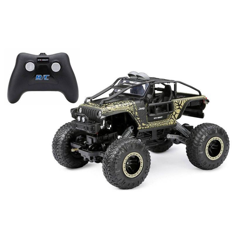 slide 1 of 11, New Bright RC Jeep Trailcat Rock Crawler - 1:14 Scale: Remote Control Truck with USB Rechargeable Battery, 1 ct