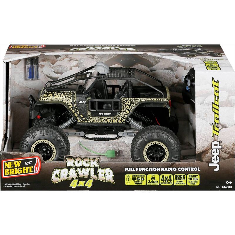 slide 10 of 11, New Bright RC Jeep Trailcat Rock Crawler - 1:14 Scale: Remote Control Truck with USB Rechargeable Battery, 1 ct