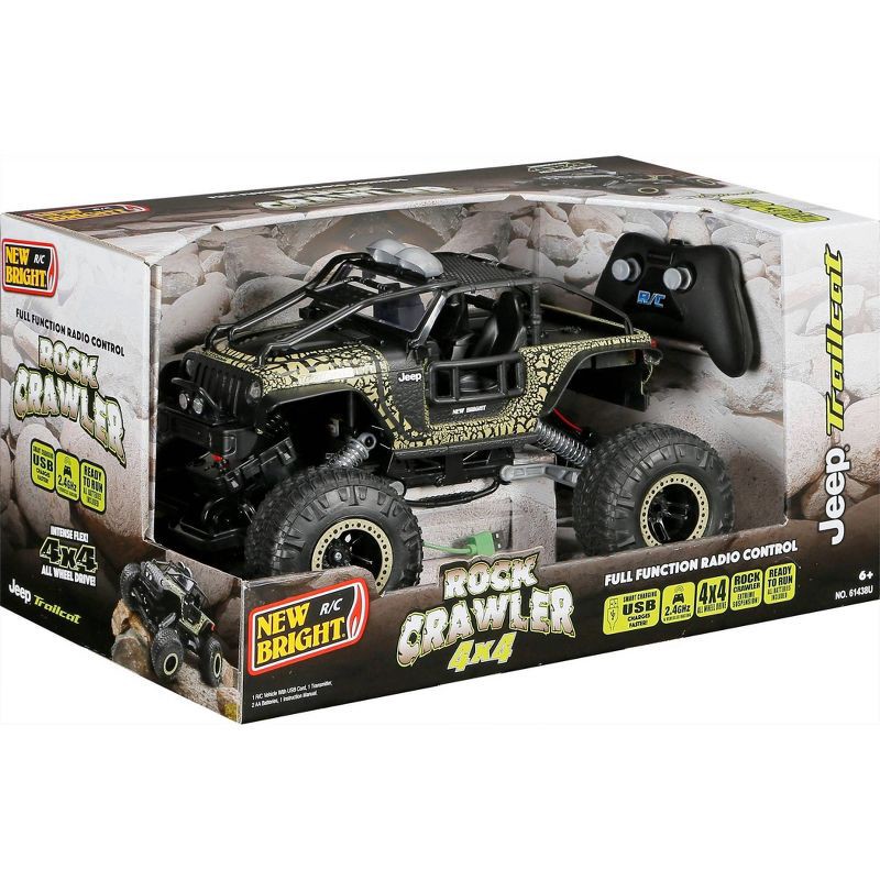 slide 3 of 11, New Bright RC Jeep Trailcat Rock Crawler - 1:14 Scale: Remote Control Truck with USB Rechargeable Battery, 1 ct
