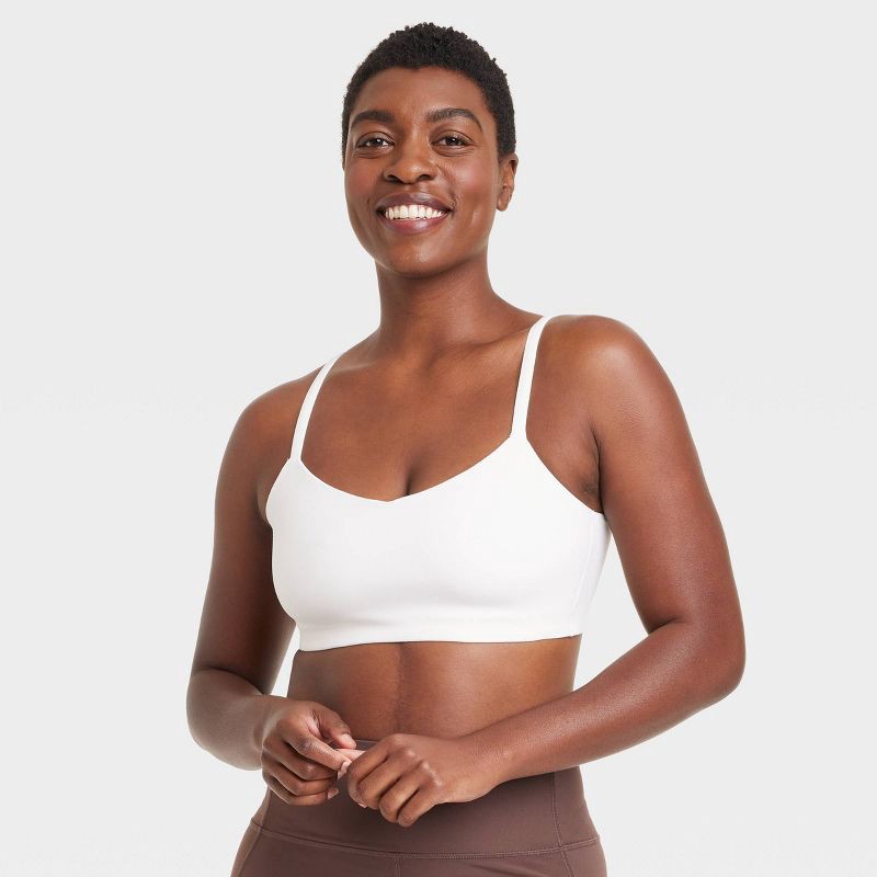 Women's Light Support Everyday Soft Strappy Bra - All in Motion Cream M 1  ct