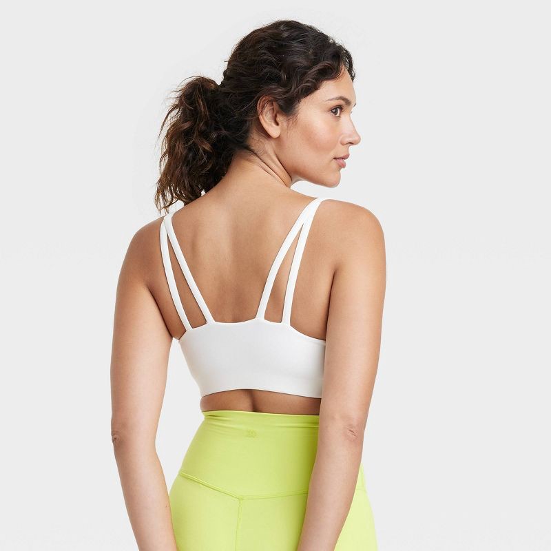 Women's Light Support Everyday Soft Strappy Sports Bra - All in Motion  Cream XXL 1 ct