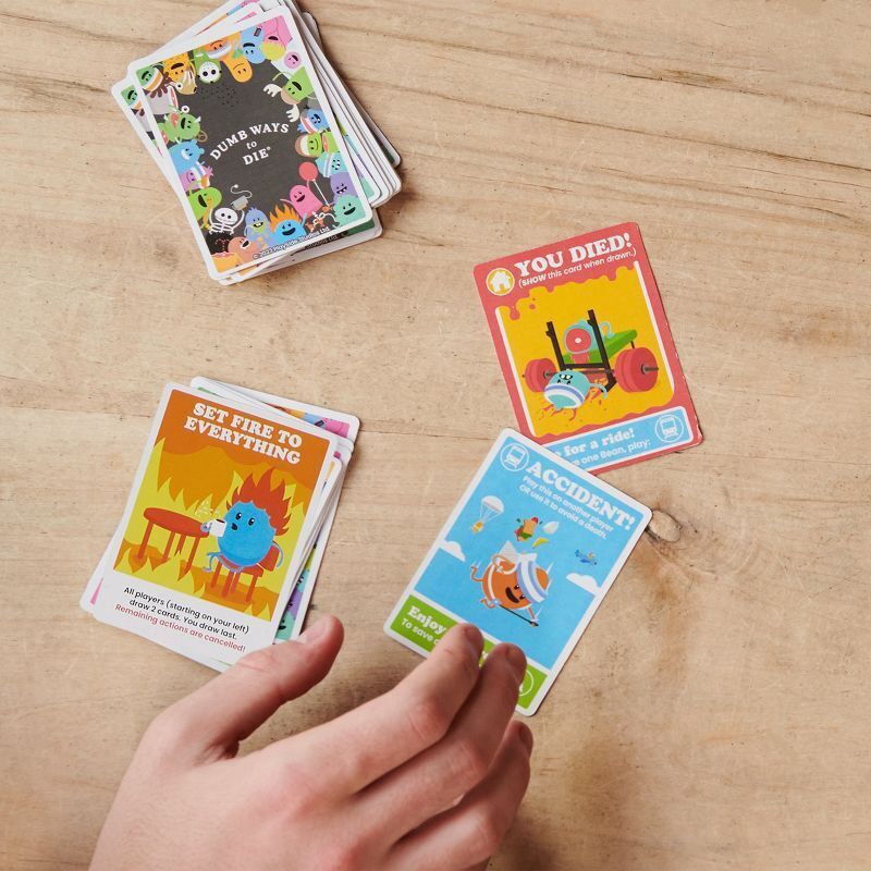 slide 2 of 9, Spin Master Games Dumb Ways to Die Card Game, 1 ct