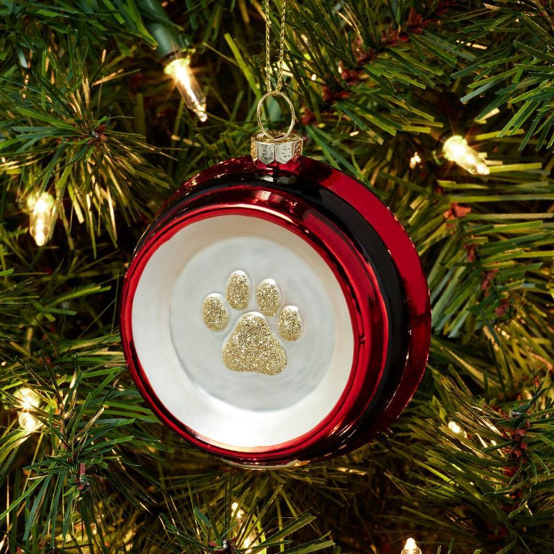 slide 2 of 3, Glass Santa Belt Pet Bowl with Glittered Paw Print Christmas Tree Ornament Red/Black/Gold - Wondershop™: Indoor Decor, 1 ct