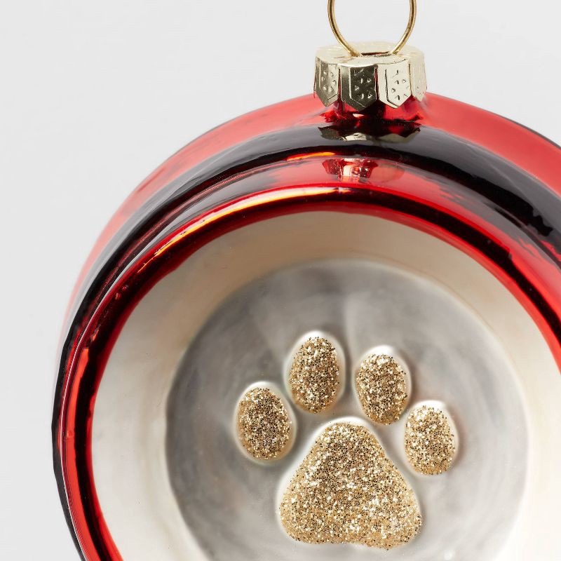 slide 3 of 3, Glass Santa Belt Pet Bowl with Glittered Paw Print Christmas Tree Ornament Red/Black/Gold - Wondershop™: Indoor Decor, 1 ct