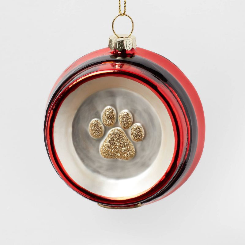 slide 1 of 3, Glass Santa Belt Pet Bowl with Glittered Paw Print Christmas Tree Ornament Red/Black/Gold - Wondershop™: Indoor Decor, 1 ct