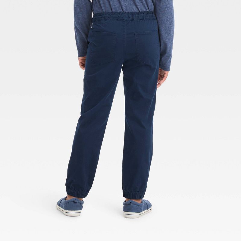 slide 2 of 3, Boys' Stretch Woven Jogger Pull-On Pants - Cat & Jack™ Blue 10: Midweight, Reinforced Knee, Elastic Waistband, 1 ct