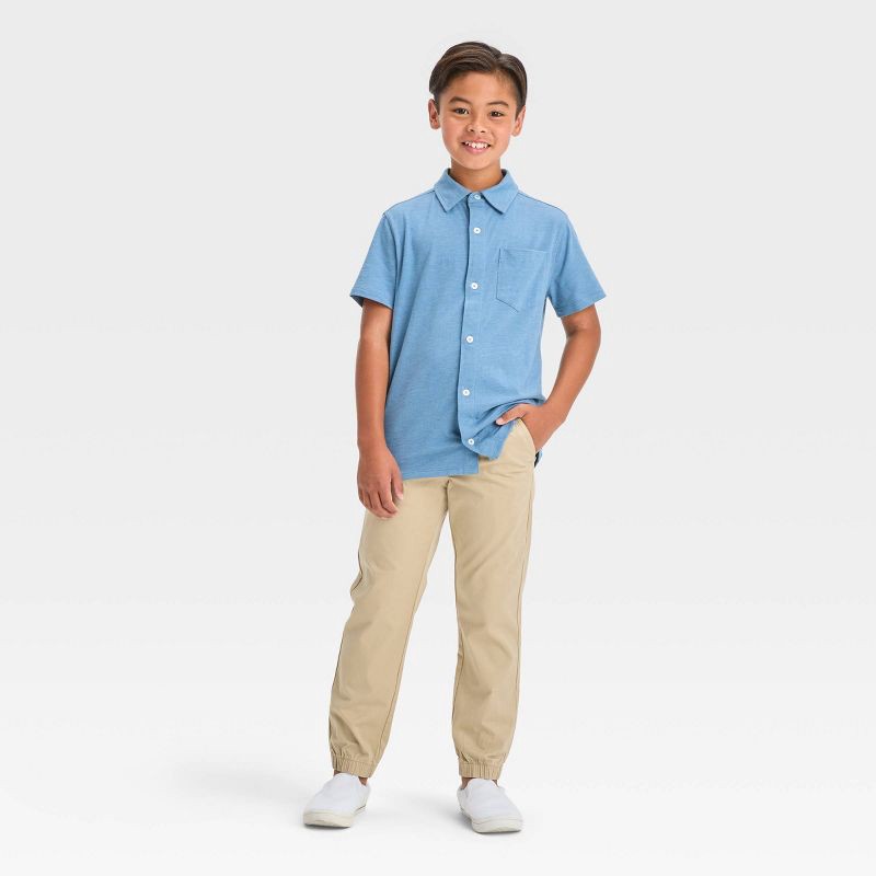 slide 3 of 3, Boys' Stretch Woven Jogger Pull-On Pants - Cat & Jack™ Beige 8: Cotton-Spandex Blend, Midweight, Elastic Waist, Tapered Leg, 1 ct