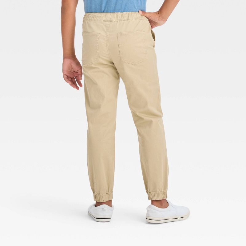 slide 2 of 3, Boys' Stretch Woven Jogger Pull-On Pants - Cat & Jack™ Beige 12, 1 ct